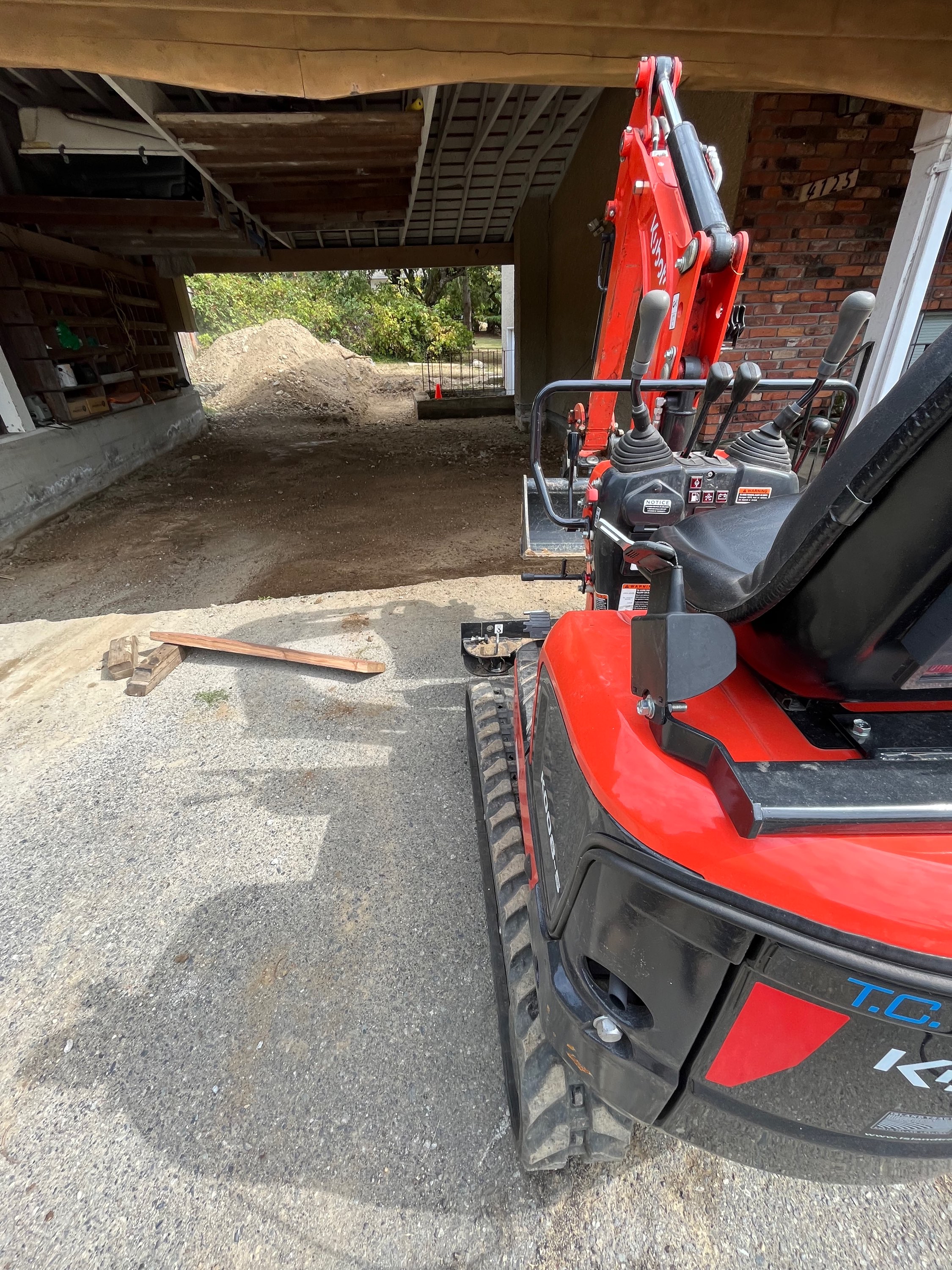 Backyard soil removal — limited gate access