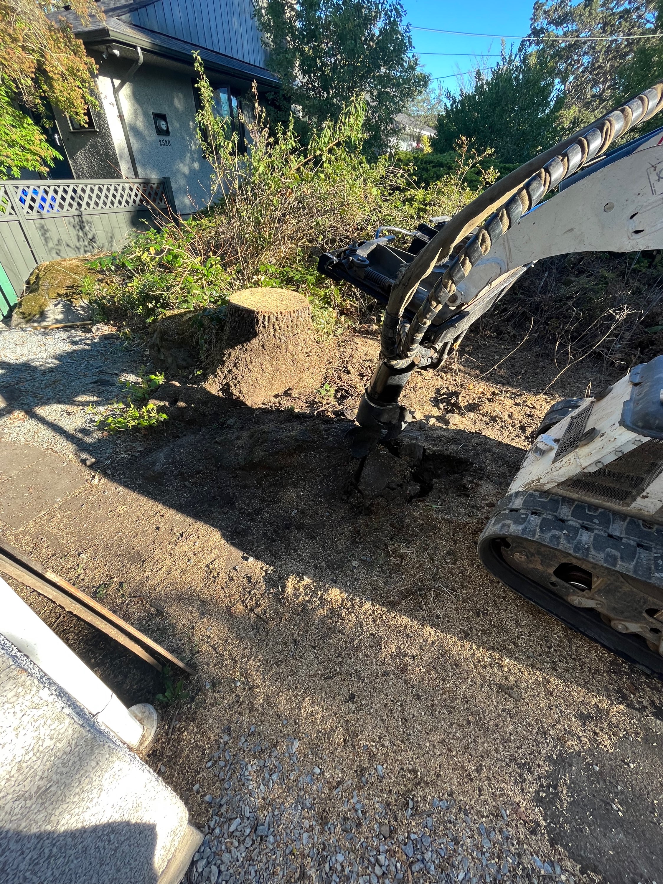 Augering fence post holes