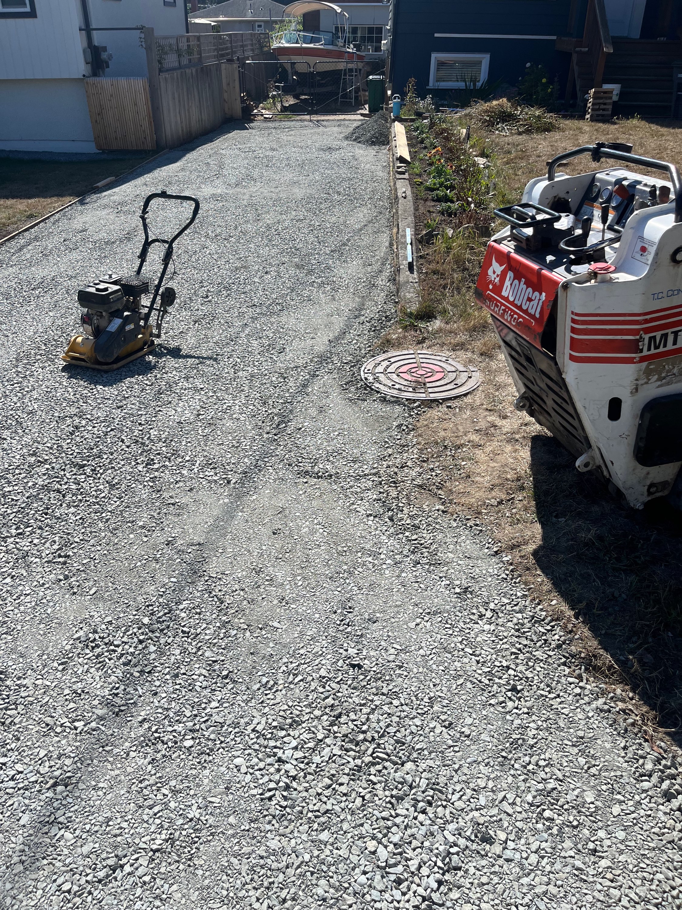 Bringing in roadbase for driveway installation